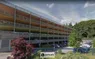 Ziekenhuis Rijnstate (Interparking) zijaanzicht parkeergarage met buiten parkeerplekken